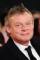 Martin Clunes as Anthony Staxton-Billing