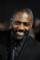Idris Elba as Reverend Charles Frank